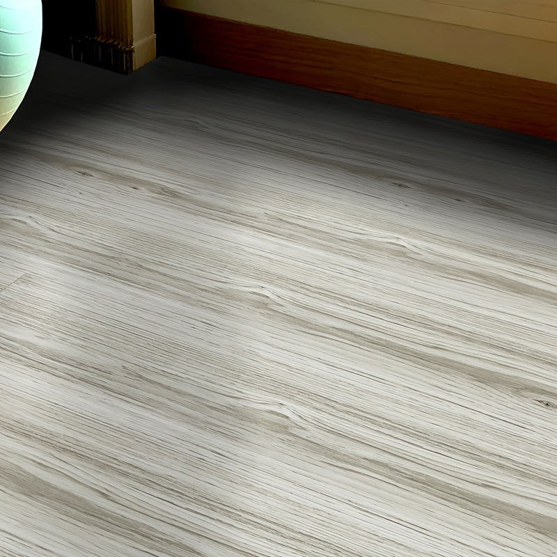 Self-adhesive floor tile sticker with durable faux wood grain design - perfect for enhancing the decor of your office or bedroom. This waterproof and non-slip sticker is designed to last.