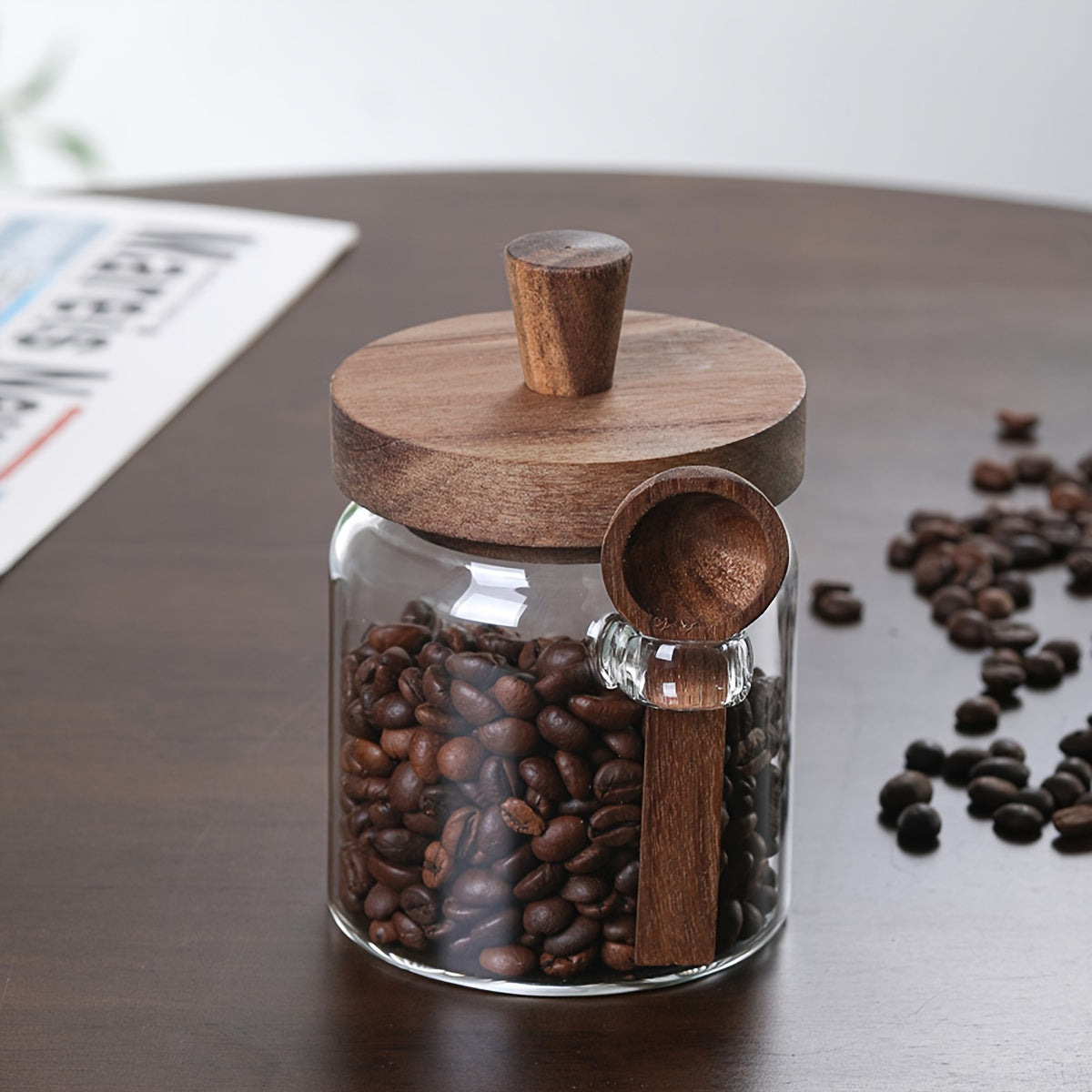 Glass containers for storing coffee, tea, grains, snacks, and pickles.