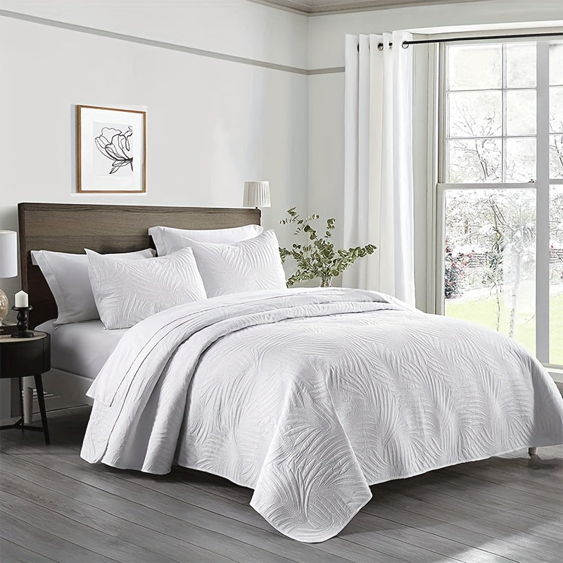 3-piece bedspread set with ultrasonic leaf pattern, reversible polyester cover, and 2 pillow shams. Soft and breathable, easy to wash.