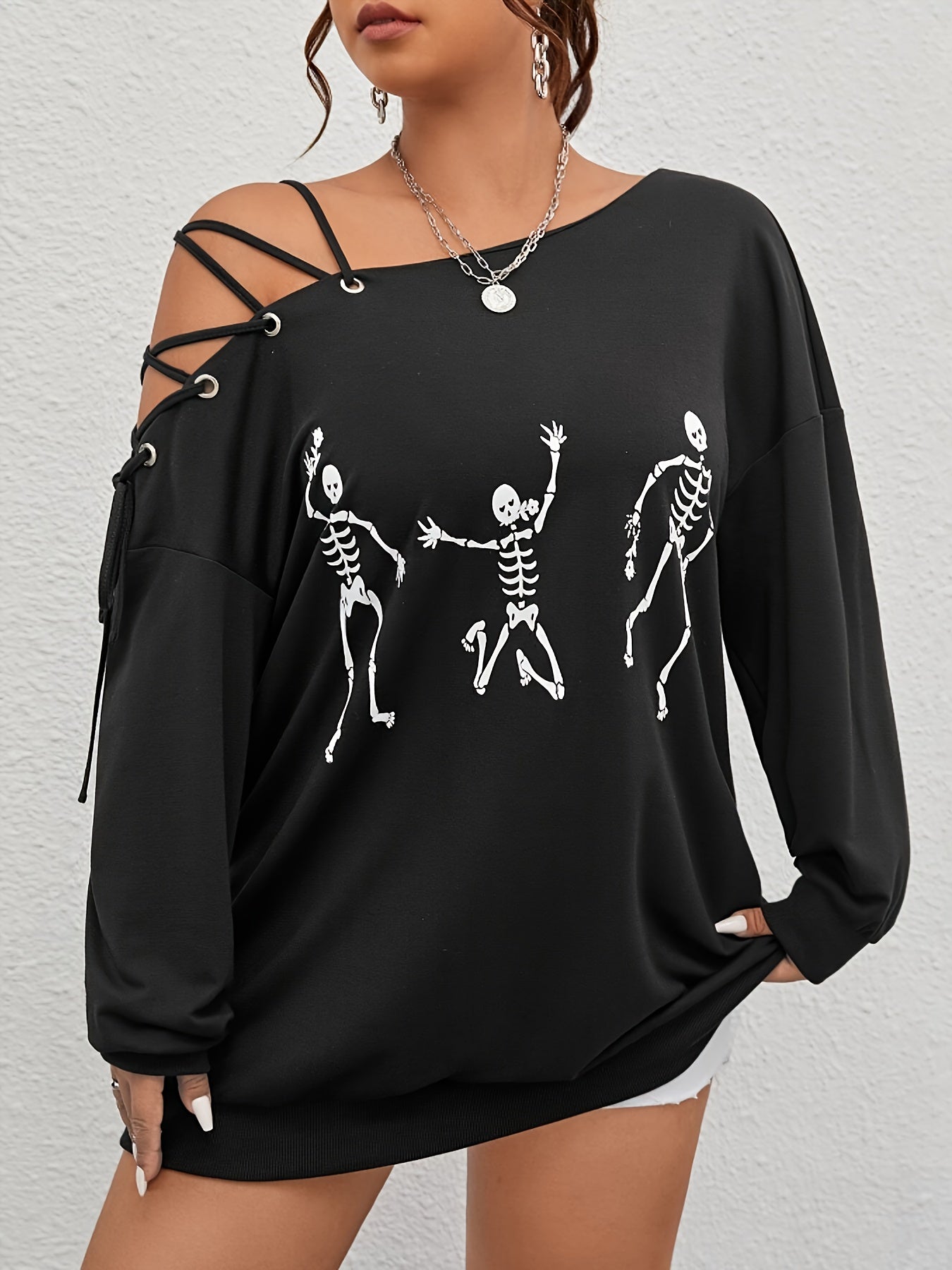 Women's Elegant Long Sleeve T-Shirt made with polyester fabric, has a relaxed fit, and is machine washable.