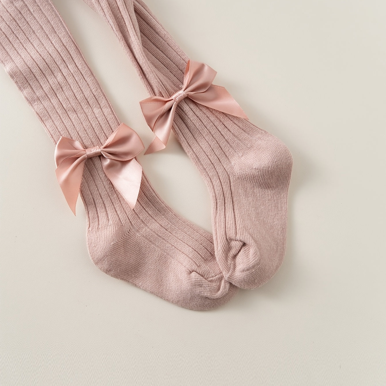 3-pack soft cotton blend bowknot pantyhose for youngsters featuring warm, breathable, and cute striped tights.