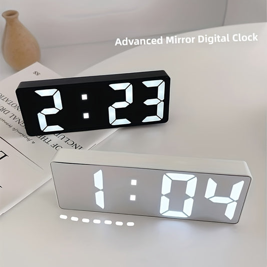 Digital clock with large LED display, mirror surface, dual brightness levels, and battery or USB charging, ideal for home décor.