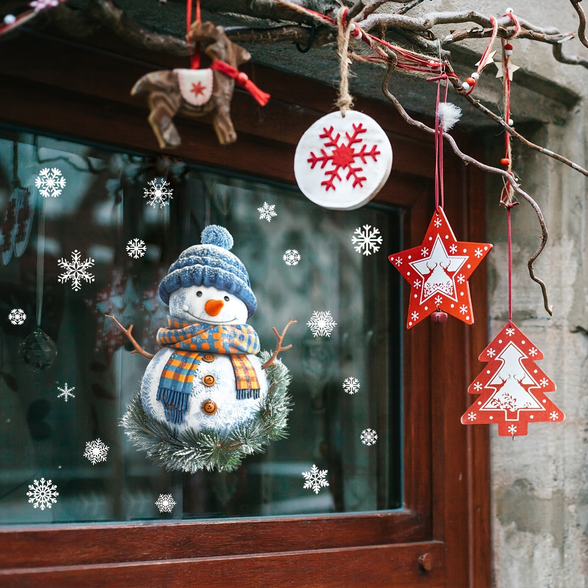 Winter holiday decoration - Double-sided Christmas Snowman window cling with blue hat and scarf, made of removable PVC static decal for festive home and mall glass decor.