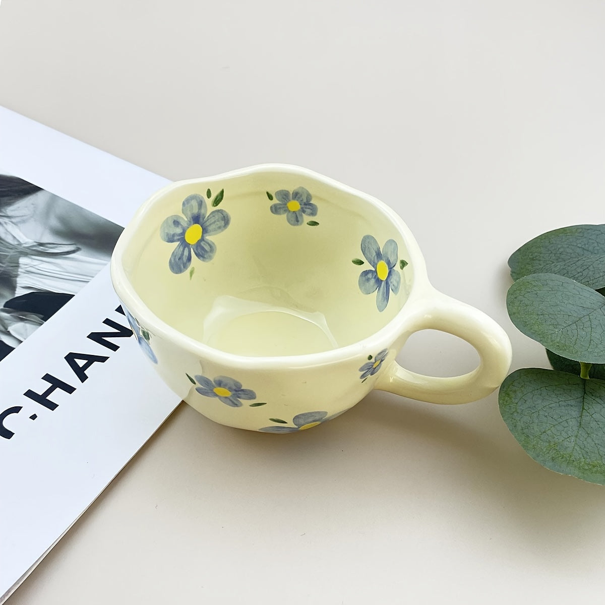 Ceramic mug with flowers pattern, irregular shape, Korean style, suitable for coffee, milk, tea, oatmeal, and breakfast.