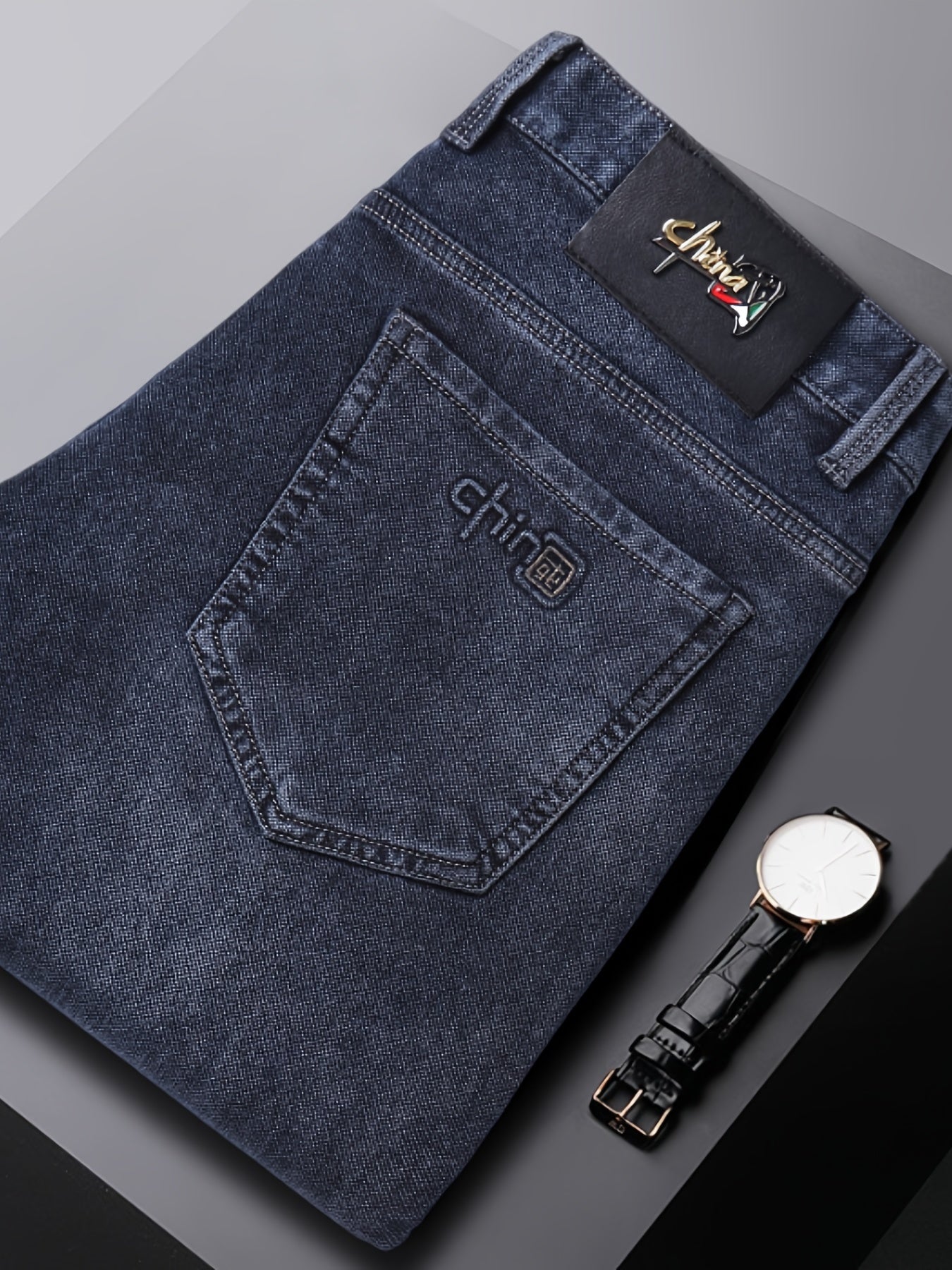 Men's semi-formal stretch denim pants with classic straight leg design and pockets, ideal for fall and winter.