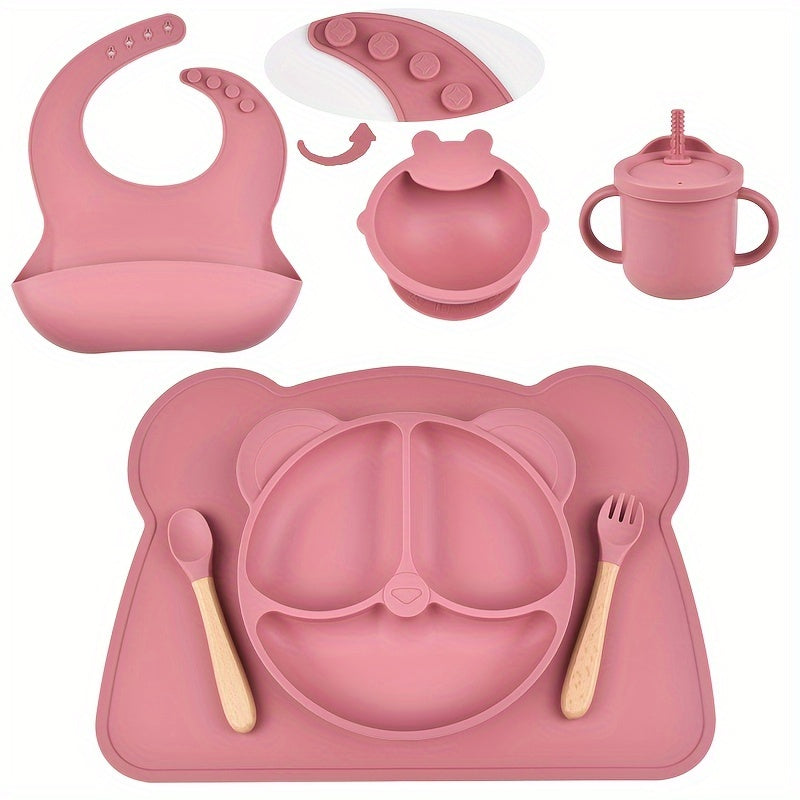 7-piece toddler meal set with silicone utensils in mixed colors, featuring cartoon design and high suction power. Easy to clean and includes placemat, plate, bowl, spoon, fork, bib, and