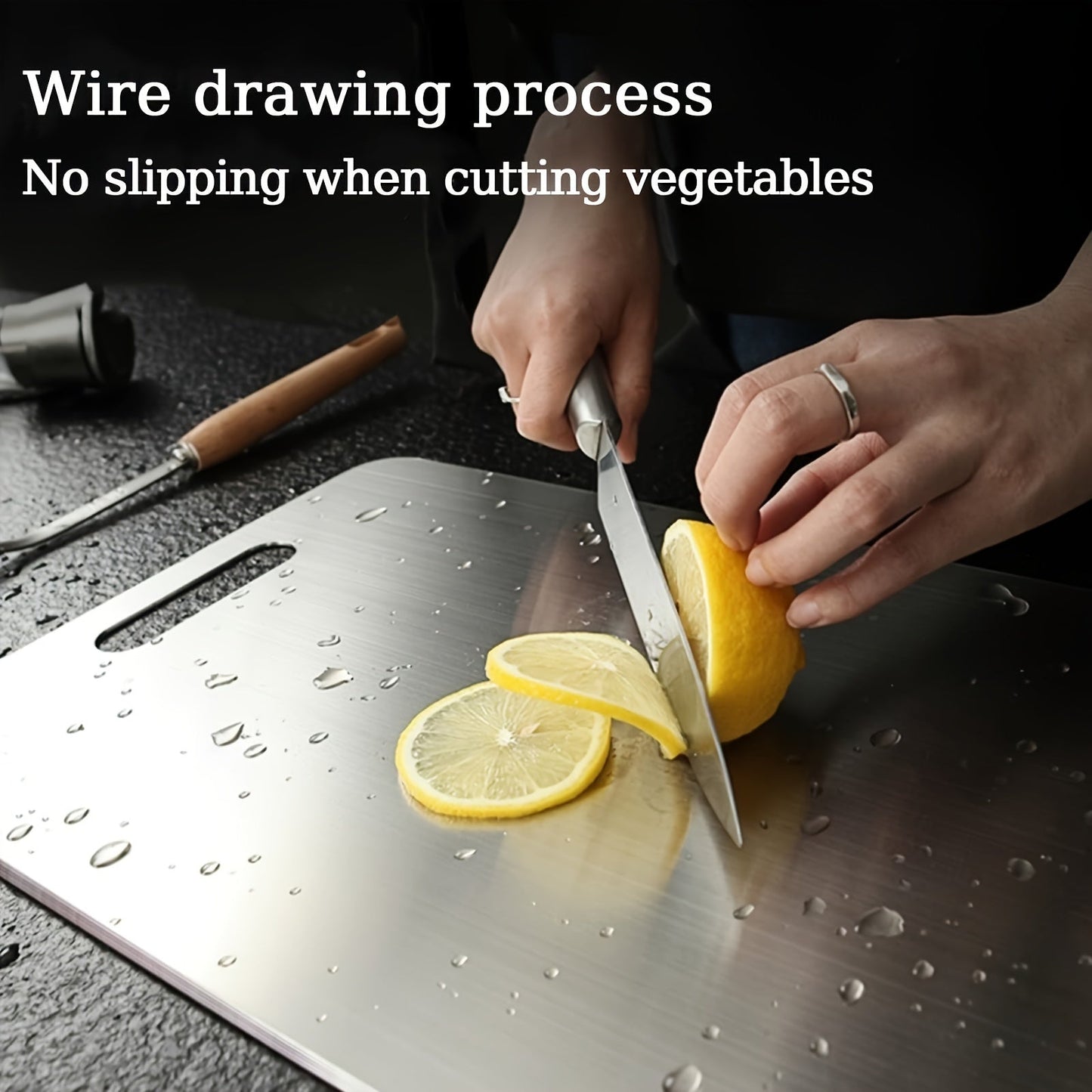 Metal chopping block for kitchen with carrying handle made of stainless steel - sturdy, versatile, and food-safe cutting surface for preparing fruits and vegetables