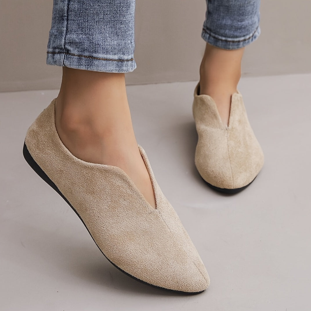 Women's solid color casual flats with a soft sole and point toe.