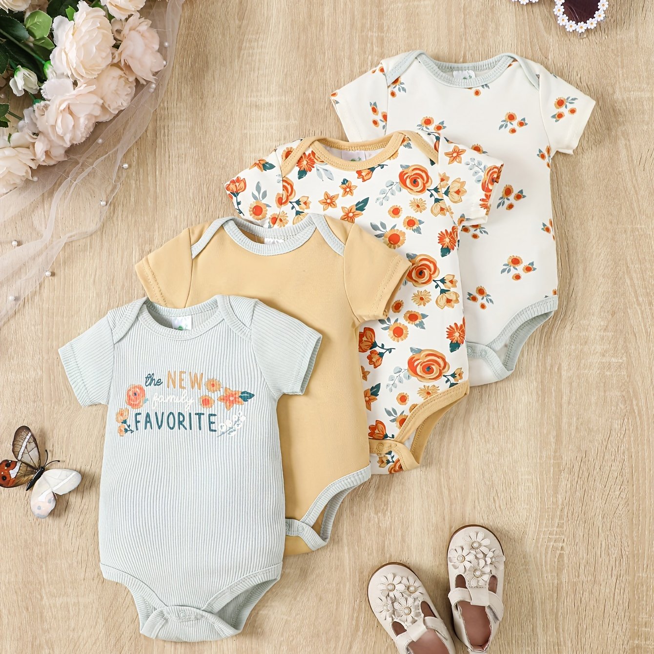 New four-piece set of triangle onesies for men and women, featuring bear cartoon pattern and creative solid color polka dot design. Made of pure cotton for comfort and softness, perfect for