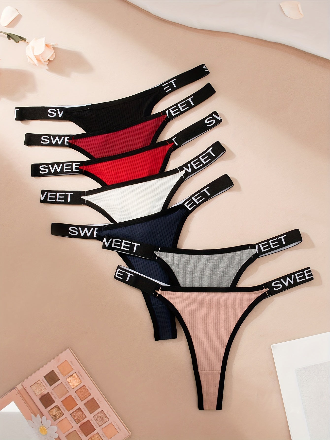 7pcs Letter Tape Contrast Binding Thongs: Sexy, comfortable, and stretchy intimates for women.