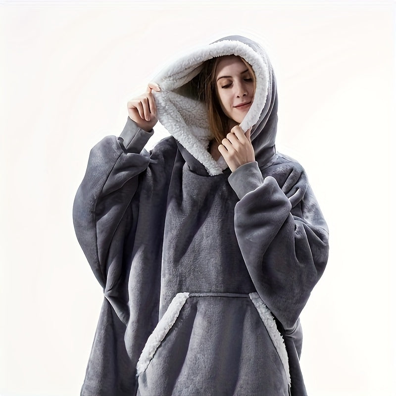 Stay warm and stylish in our cozy plaid fleece hooded blanket sweatshirt! With large pockets for convenience, this oversized wearable blanket is perfect for men and women. It's soft, warm, and machine washable, making it ideal for TV binge-watching.