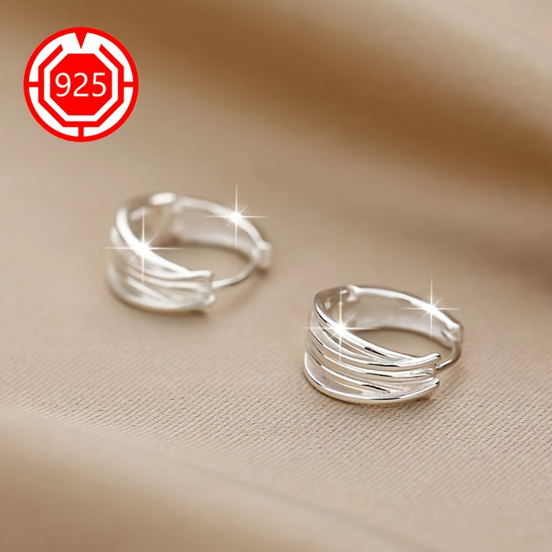 925 Silver Hypoallergenic Earrings are a stylish pair of linear earrings designed with a simple, yet unique crisscross woven ear decoration. These earrings are perfect for gifting to couples, best friends, or as a daily gift for any occasion including