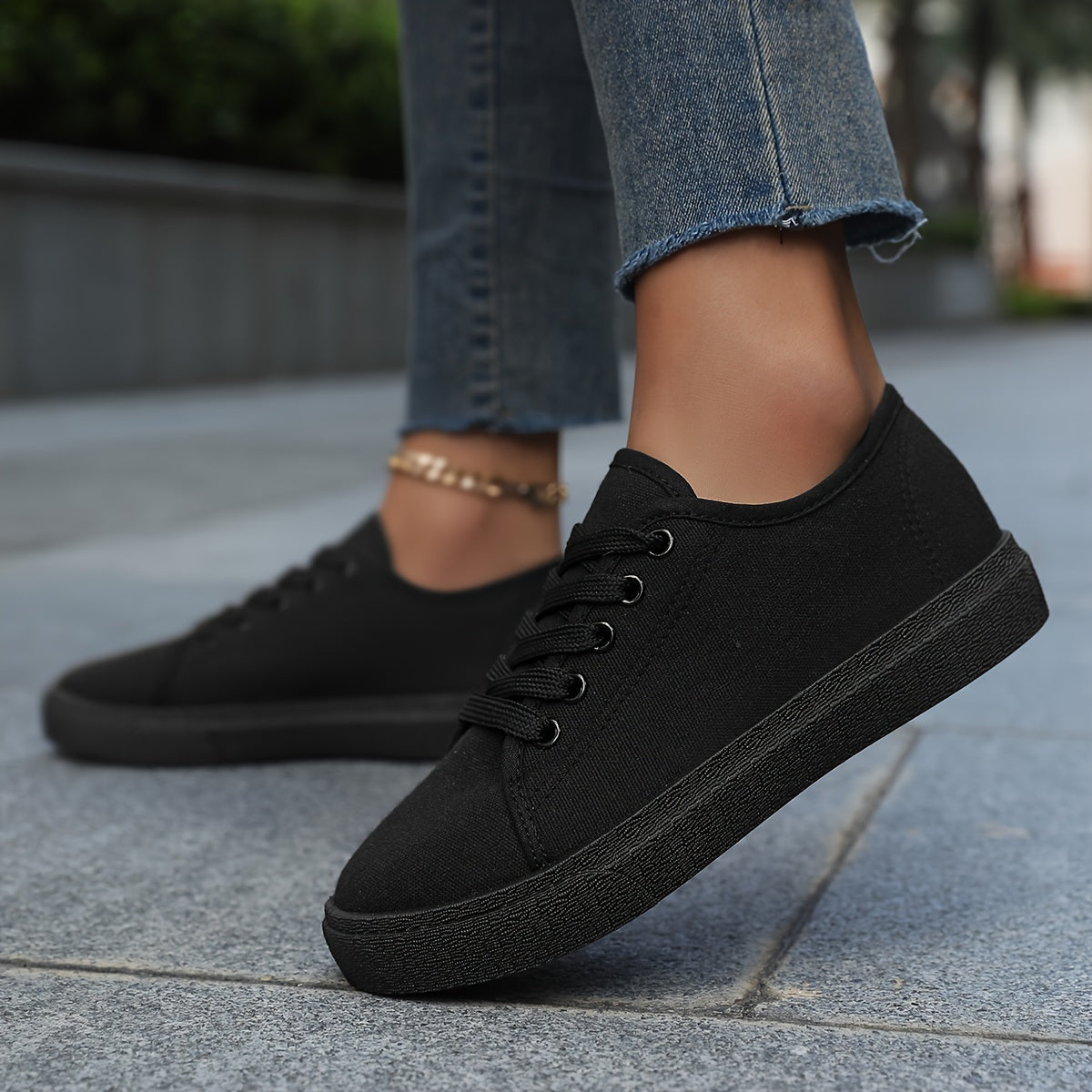 Women's platform skate sneakers with breathable fabric upper and durable PVC sole. Versatile casual shoes for walking and outdoor activities in black and white. Features comfort insole.