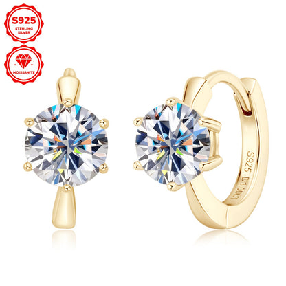 These elegant earrings feature a pair of round Mozambique stones, each 6.5mm in diameter and D color. The stones are set in a single six-prong setting with a 10mm inner diameter, crafted from 925 sterling silver. Accompanied by a GRA certificate, these