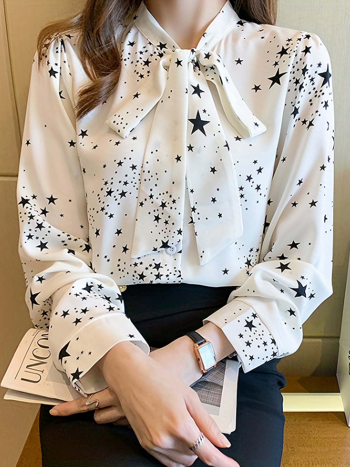 Chic long sleeve blouse with bow tie detail, made of 100% polyester and machine washable. Perfect for spring and fall fashion.