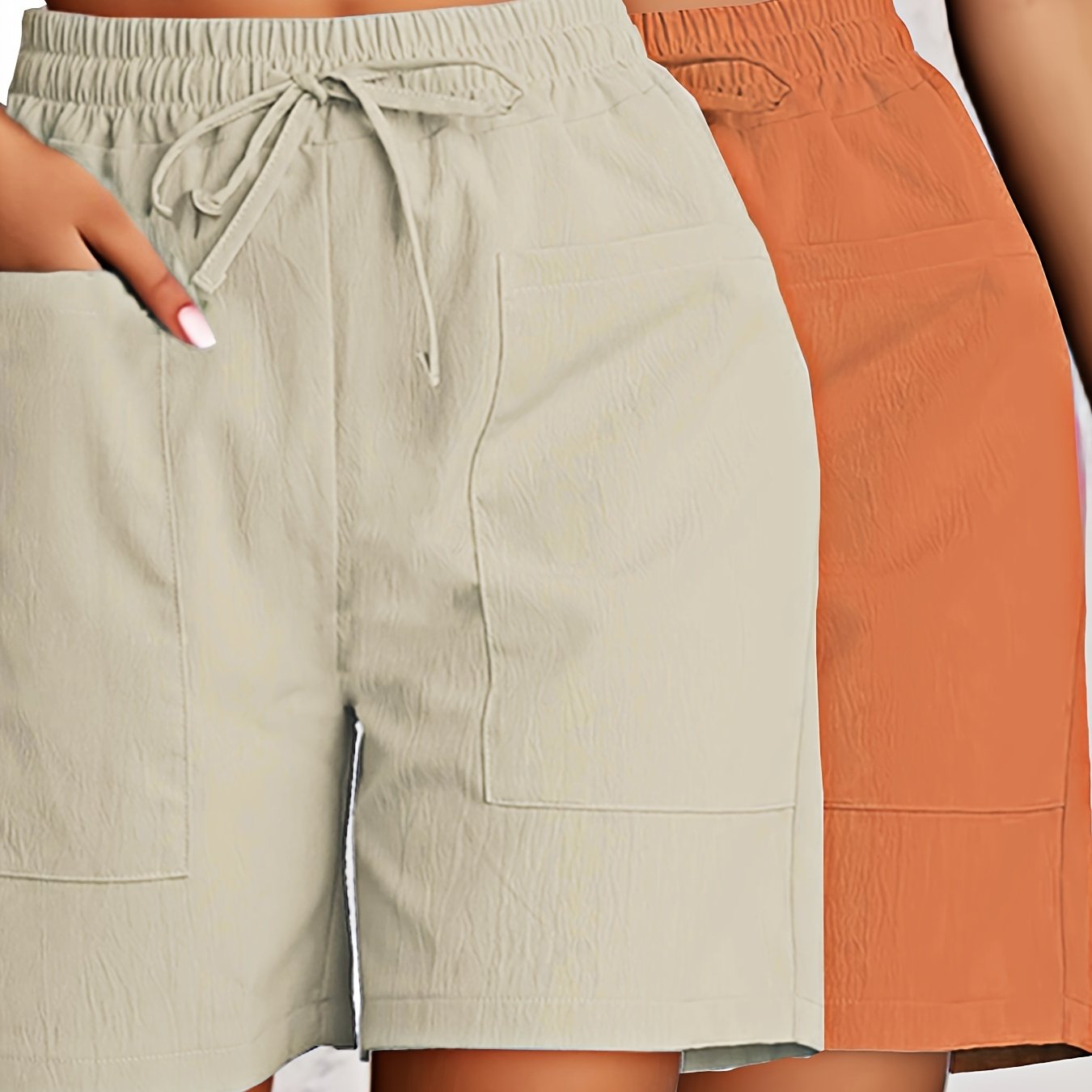 2-Pack of Women's breathable cargo shorts in solid colors. Made of lightweight polyester with dual pockets and drawstring detail. All-season fashion.