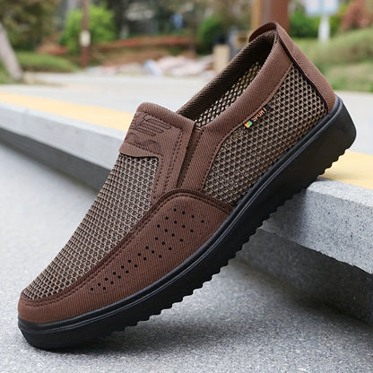 Men's slip-on sneakers with breathable mesh upper, non-slip TPU sole, comfortable fabric insole, solid black design with hook & loop fastener for all-day comfort.