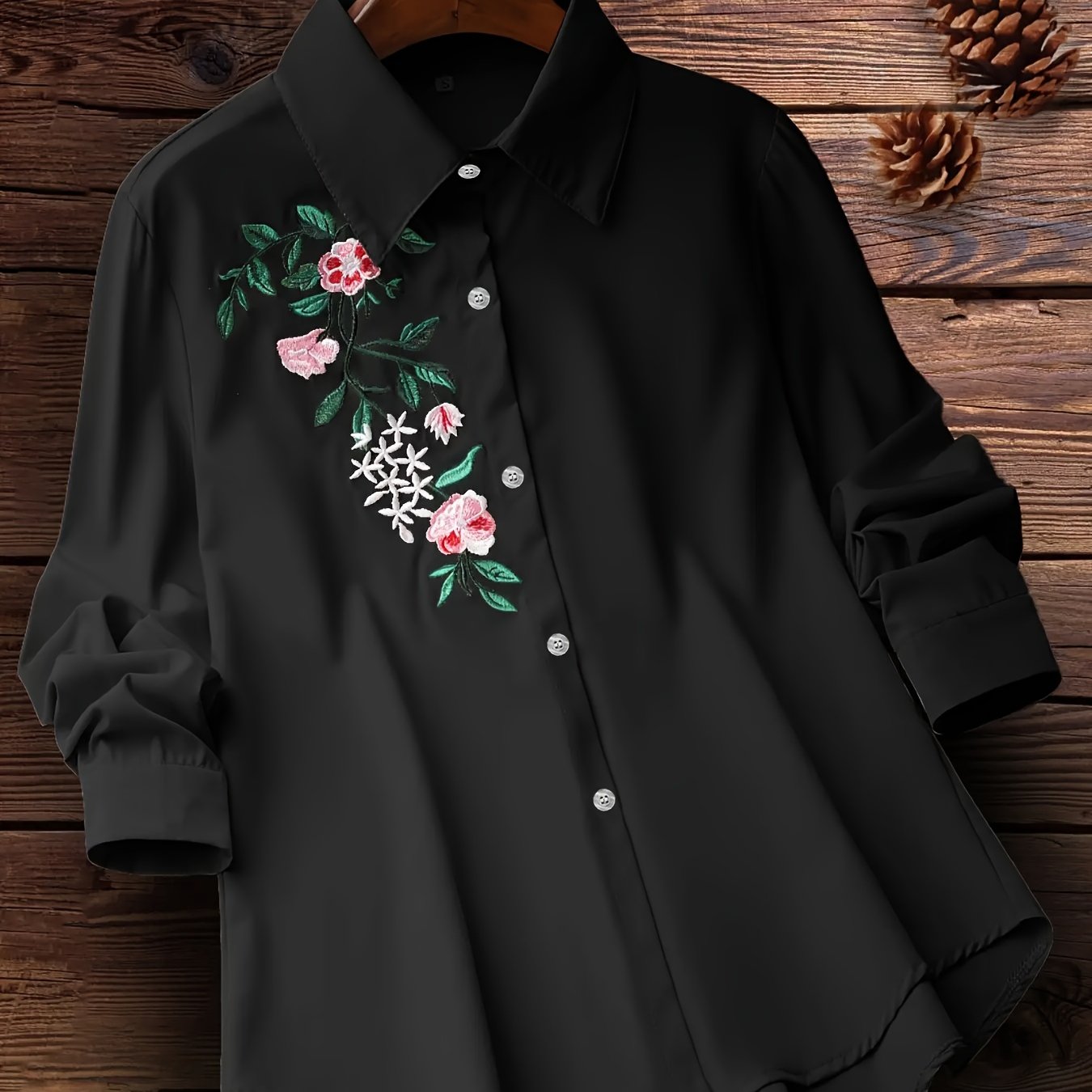 Embroidered floral button-up shirt for women, perfect for spring and fall.