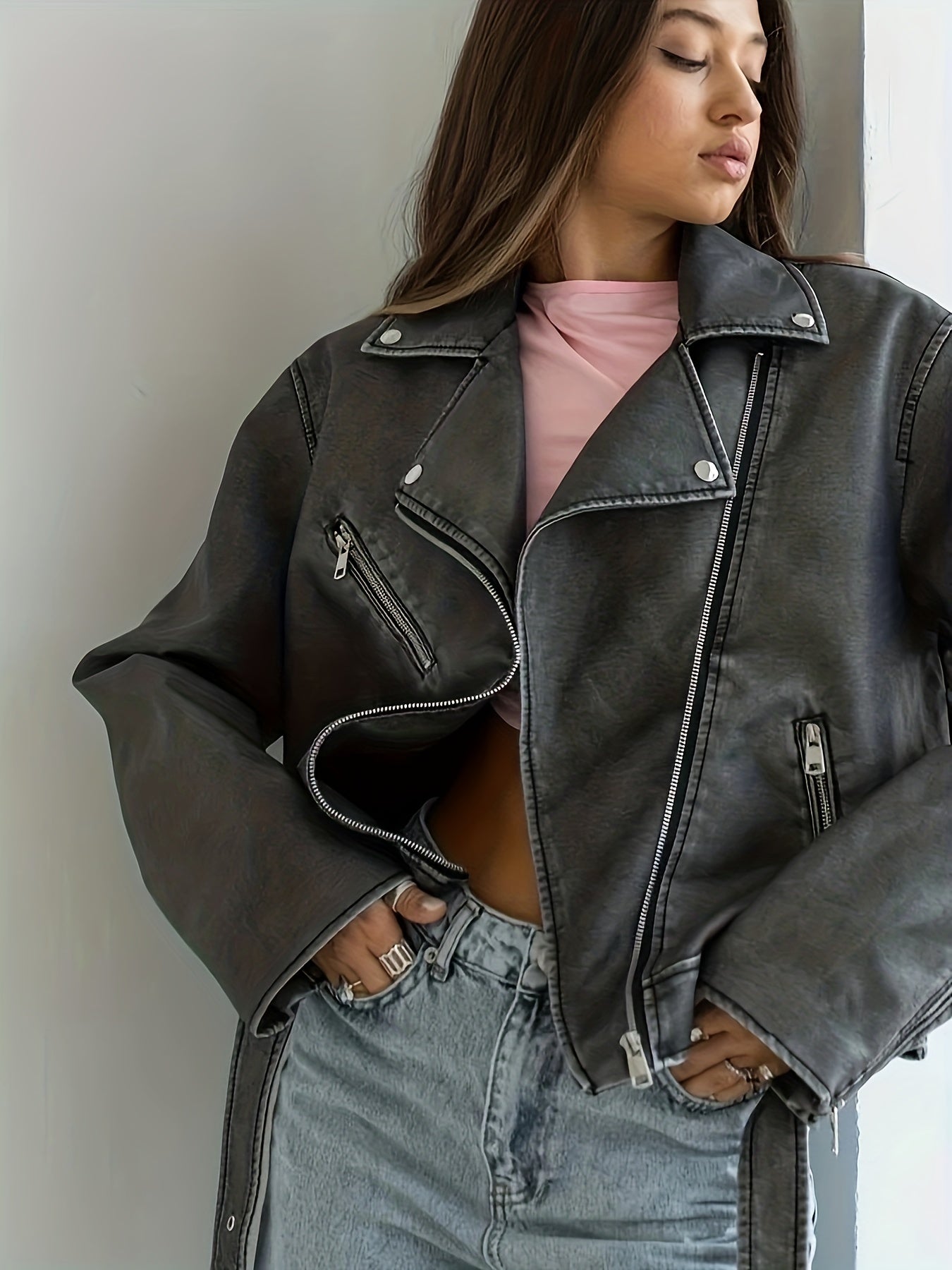 Women's Vintage Biker Jacket with Belted Lapel and Slant Zipper Pockets.