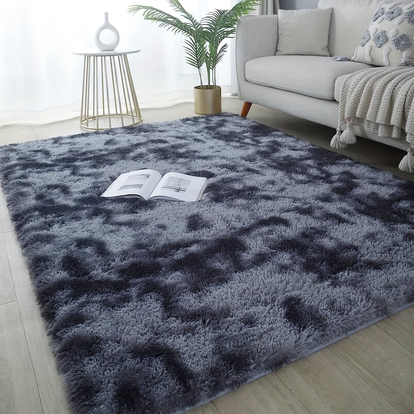 Luxurious Soft Faux Fur Area Rug in Modern Deep Grey Shaggy Design, Perfect for Living Room or Bedroom Decor. Made of Ultra Soft Polyester Material, Dry Clean Only. Available in Various Sizes.