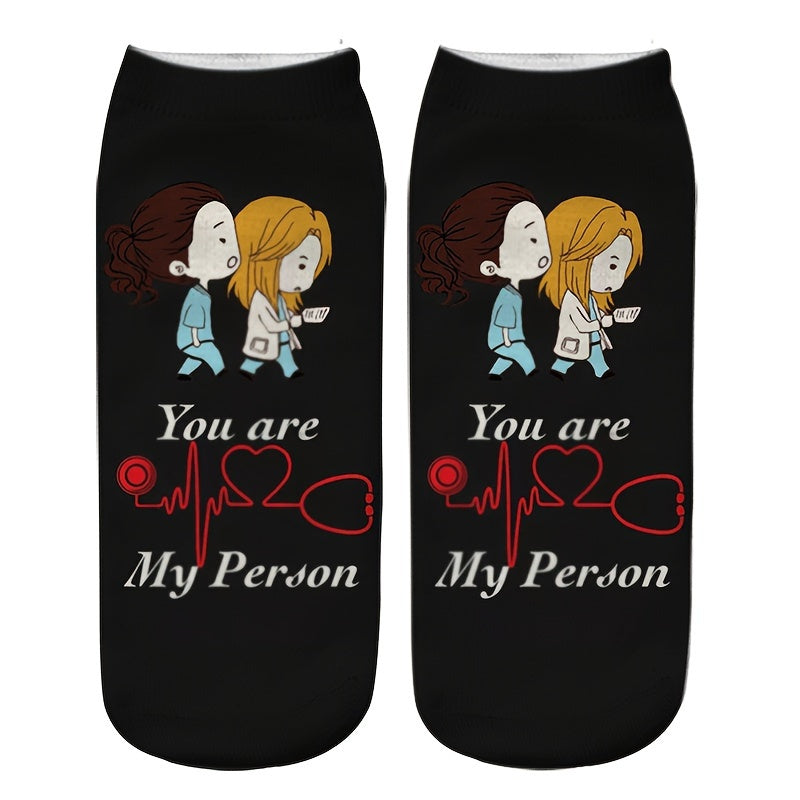 Whimsical cartoon nurse socks with Grey's Anatomy inspired designs, perfect for medical professionals and students. Made of soft polyester blend. Ideal gift for graduation or work