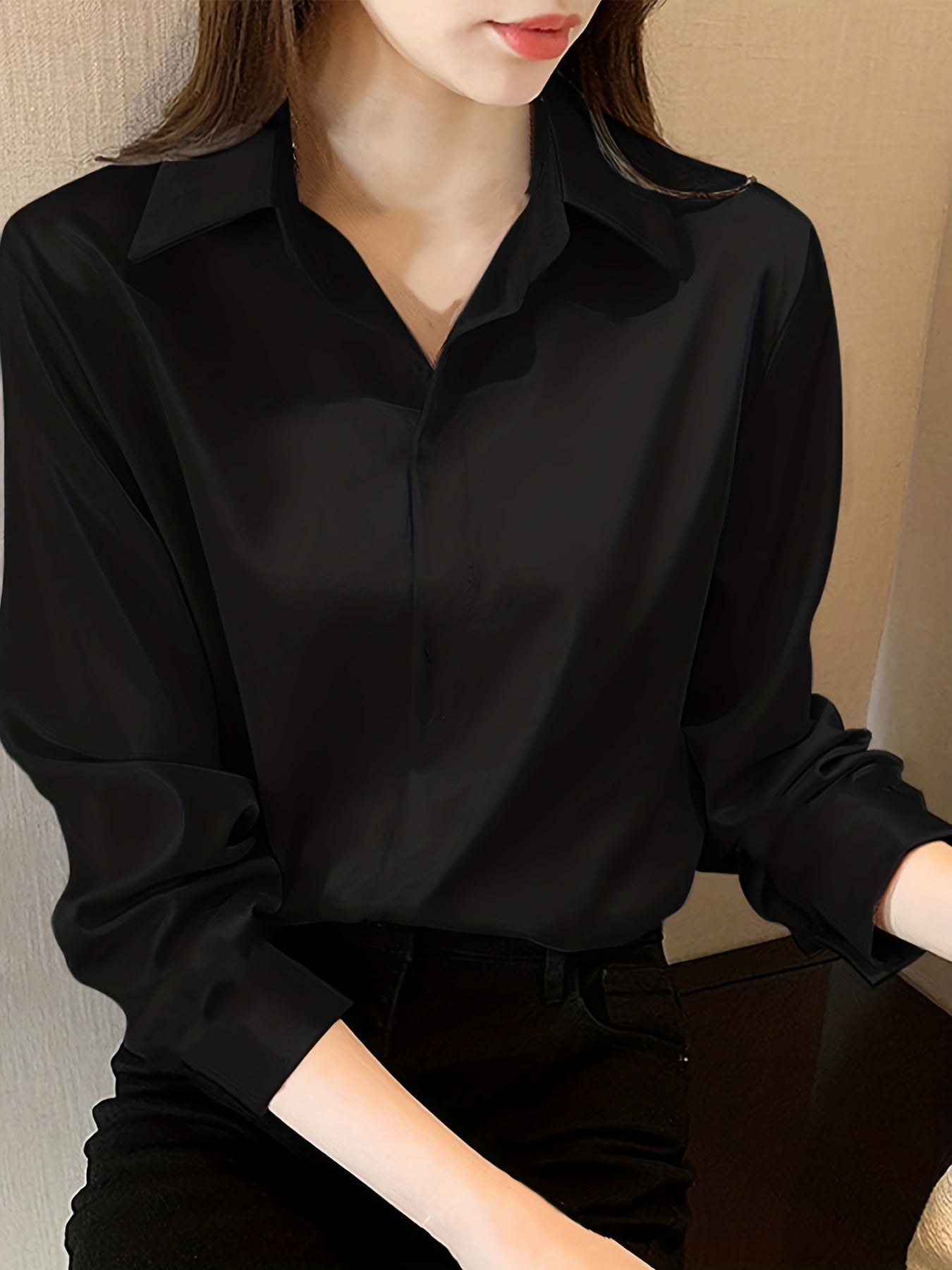 Elegant black long sleeve shirt for women, perfect for all seasons made of non-stretch polyester fabric.