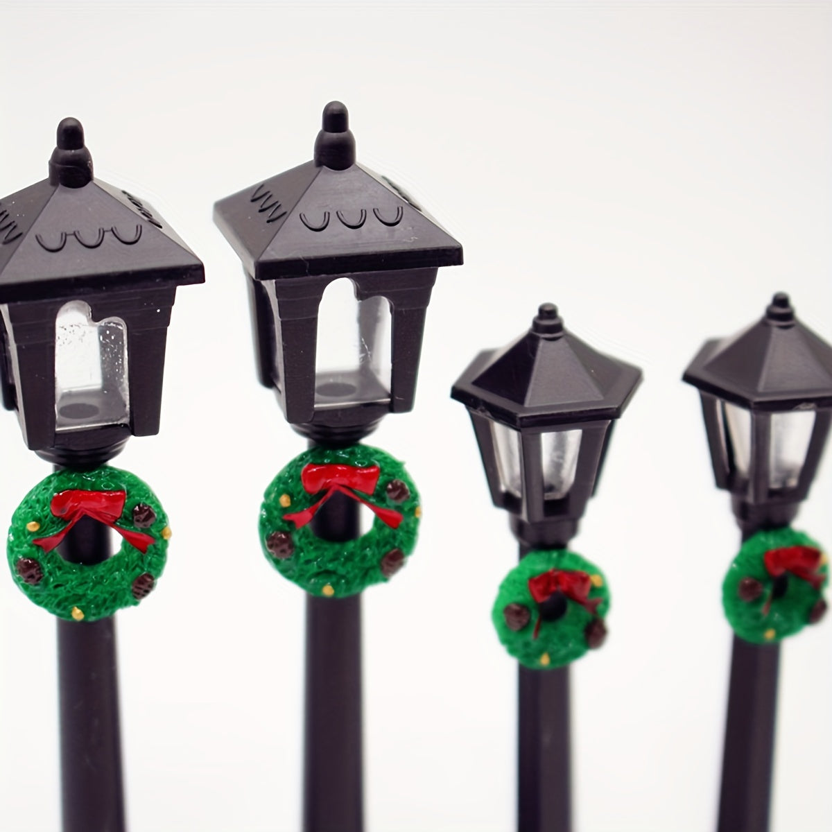 3 Miniature Christmas Lamp Posts with Wreaths, Collectible Seasonal Figurines, Plastic Material, No Electricity Needed