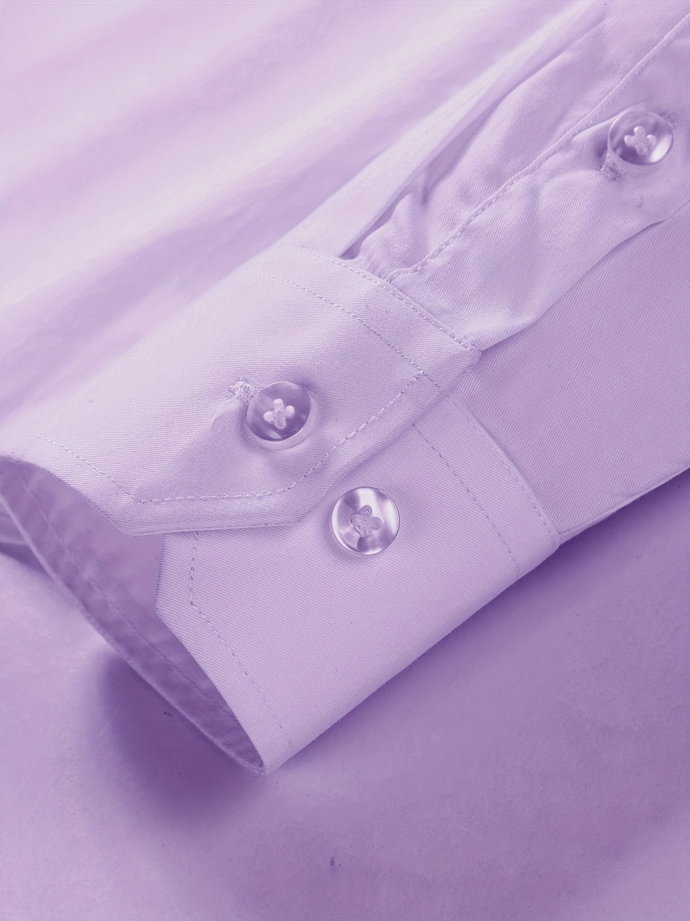 Classic men's button-down dress shirt in solid color, suitable for business casual office wear in the spring season.