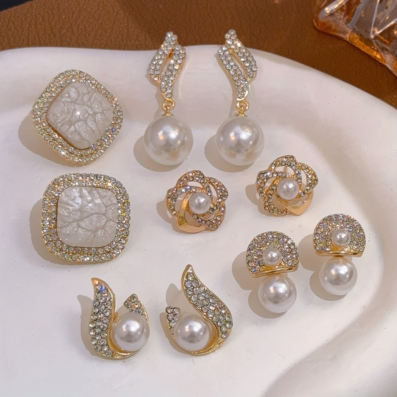 French-inspired sweet earrings set with deluxe faux-pearl, ice-crack floral, and flame design in an elegant vintage style fashion.