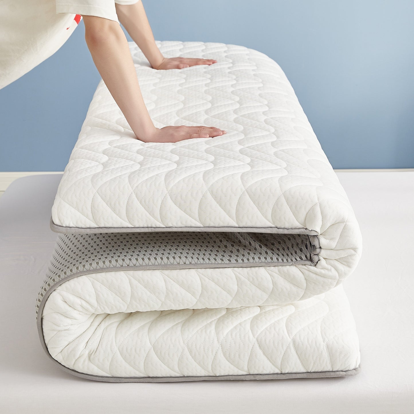 Mattress pad, 6-8cm thick, high elastic, breathable, non-slip, foldable, spot-clean, 100% polyester, woven fabric, 200-250gsm. Pillow not included.