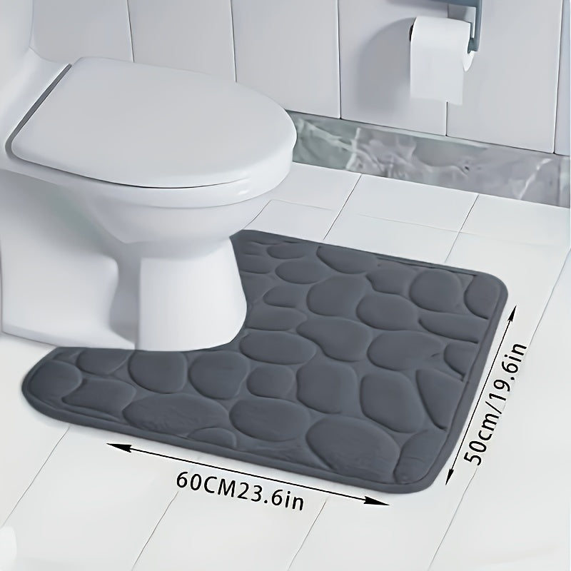 Soft and absorbent memory foam bathroom mat with non-slip backing. Machine washable and quick-drying. Suitable for bathroom, kitchen, laundry, bedroom, and shower.