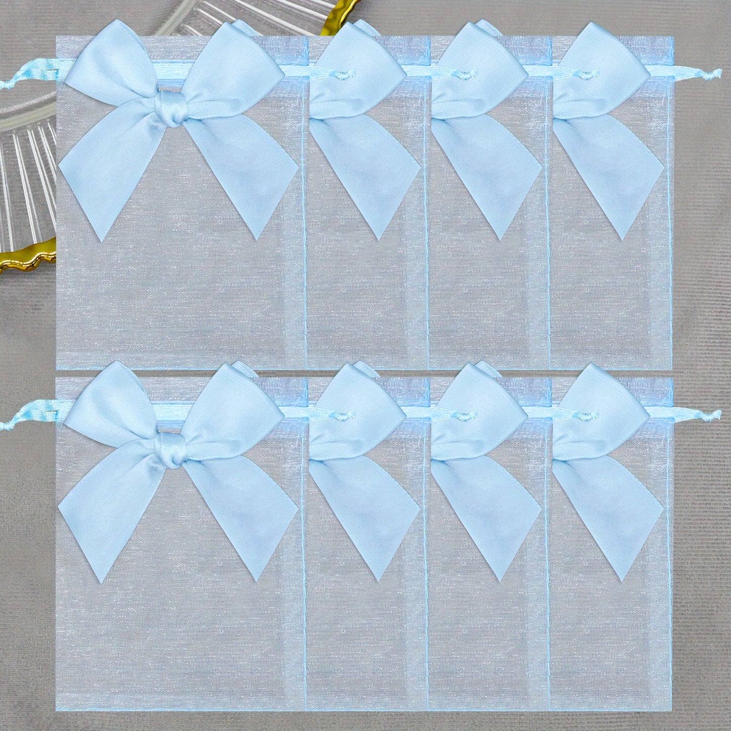 10 elegant organza bags with ribbon and bow, ideal for gift wrapping and party favors.