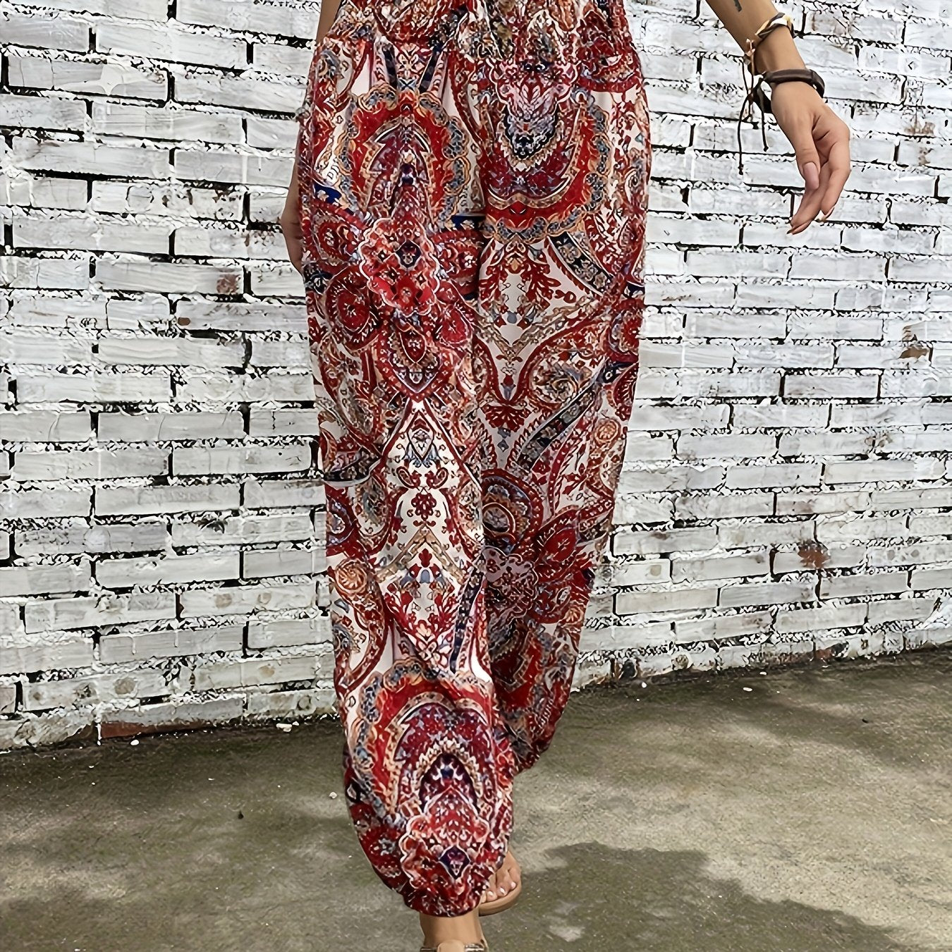 Ethnic style printed pants for women with pocket, button, and elastic waist in plus-size.