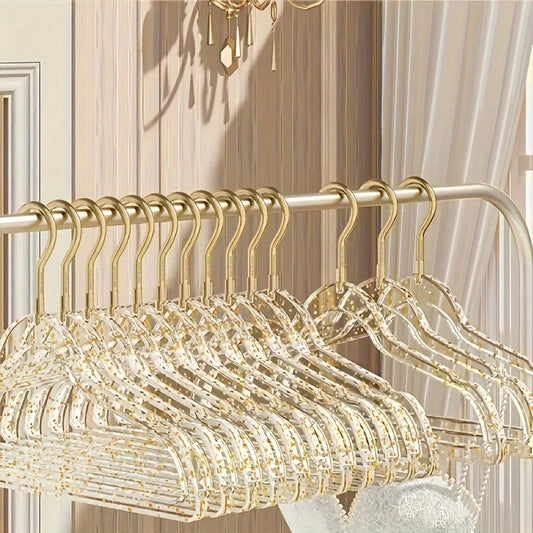 A set of 12 premium acrylic hangers with a non-slip, sparkling transparent design, providing a firm grip for wardrobe storage. These durable, thick hangers are perfect for bedroom closets, offering a traceless hanging solution.