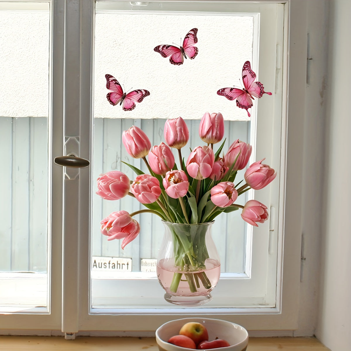 Contemporary Style Pink Tulip Butterfly Window Stickers, featuring a Floral Patterned design. Made from Polyvinyl Chloride Material, these stickers are easy to apply with their Static Cling Mounting and are reusable. Available in Assorted Shapes, these