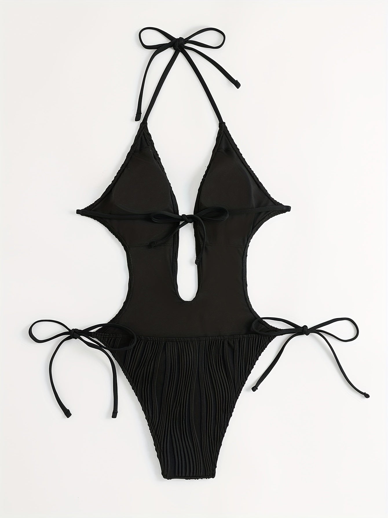 Sexy, high stretch backless halter one-piece swimsuit for women with tie detail; machine washable.