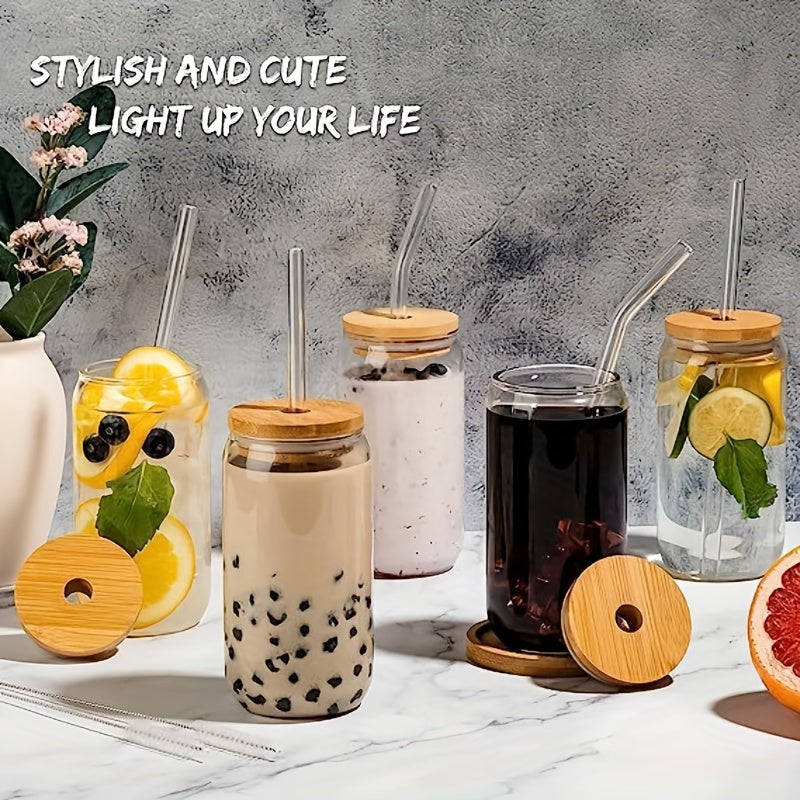 Glass cups with bamboo lids and straw, beer can shaped, 16 oz capacity for various drinks.