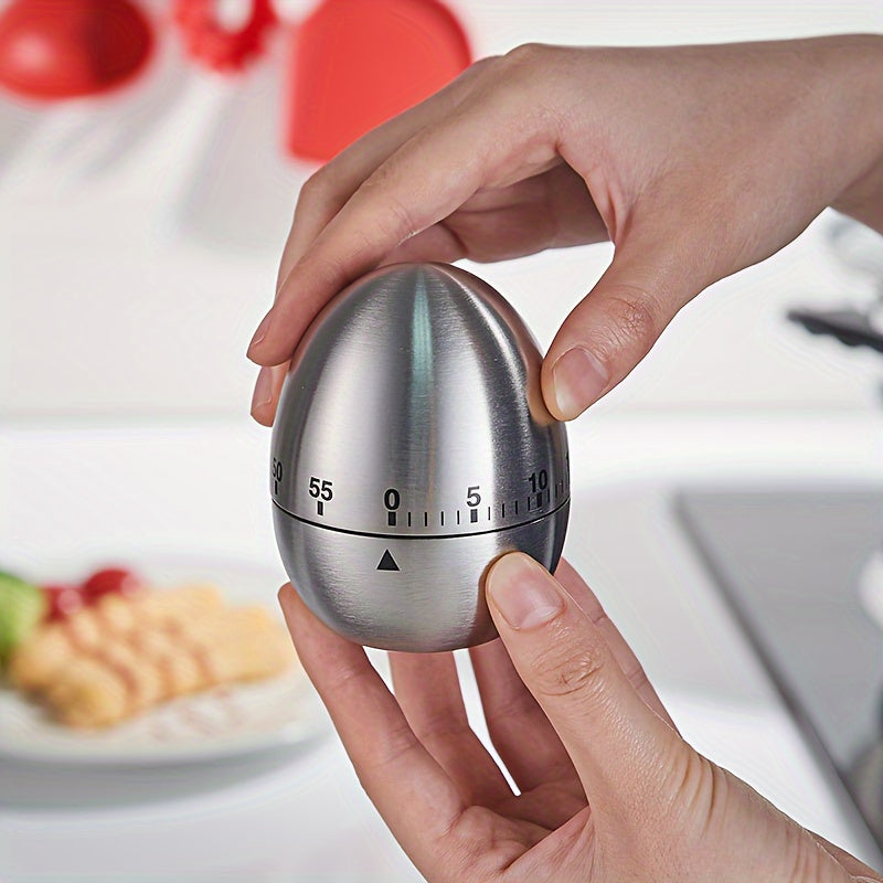 Egg-Shaped 60-Minute Kitchen Timer made of Stainless Steel, Features Mechanical Rotating Alarm, No Electricity Needed, Ideal for Cooking and Educational Purposes, Essential Home Kitchen Accessory.