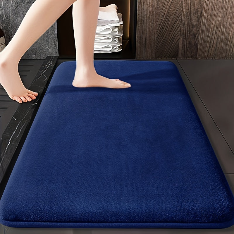 Soft coral fleece bath mat - absorbent, non-slip, washable rug for bathtub & shower, premium comfort accessory.