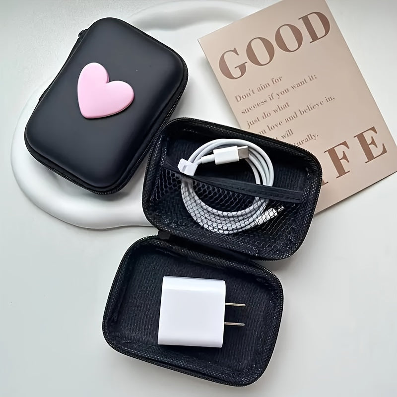 Heart-shaped PU leather case for earphones and charger with zipper closure. Features anti-fall design, cable organizer, and no battery required.