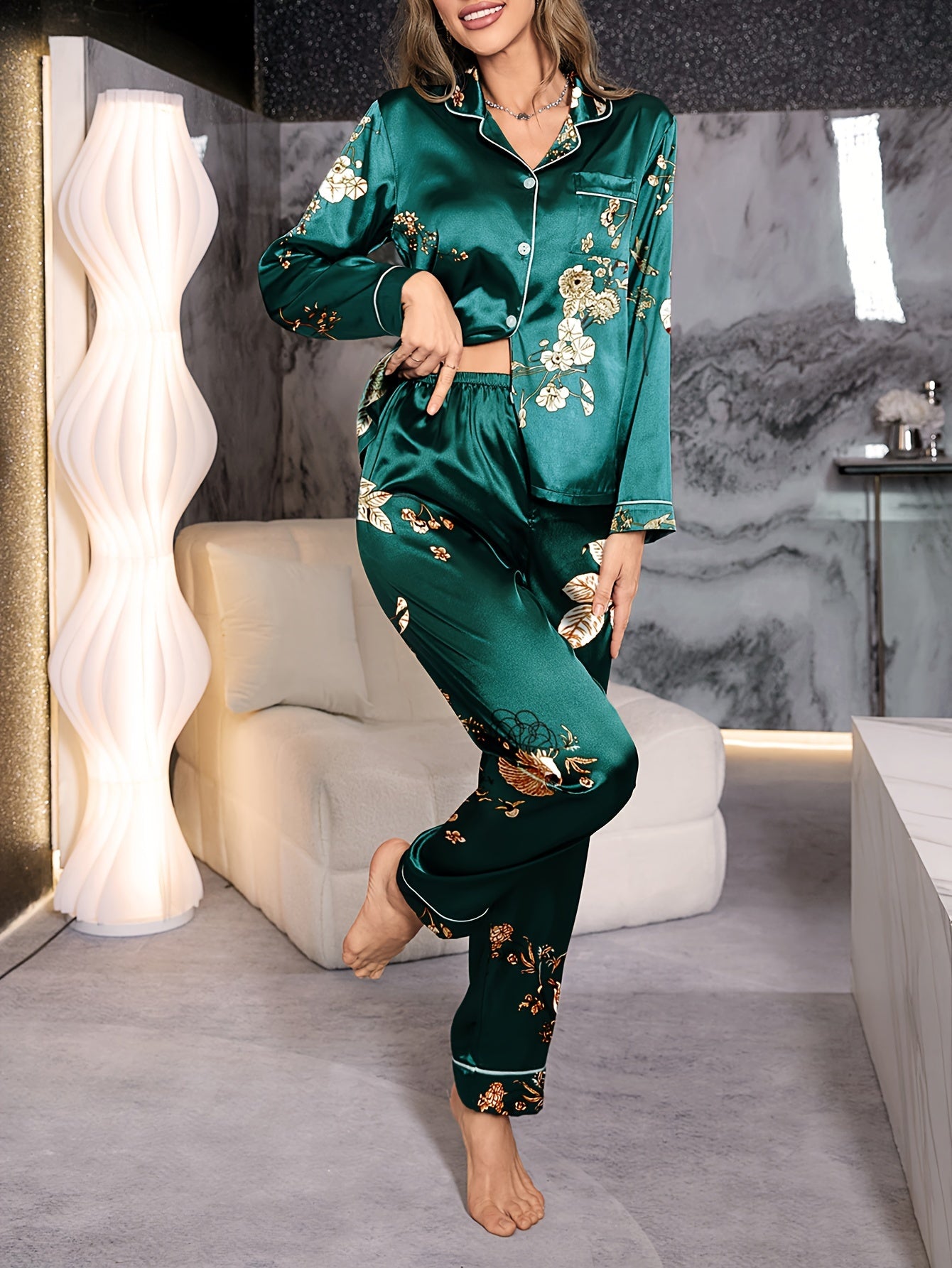 Floral satin pajama set for women, featuring long sleeve top with lapel buttons and matching pants, perfect for a cozy fall look.