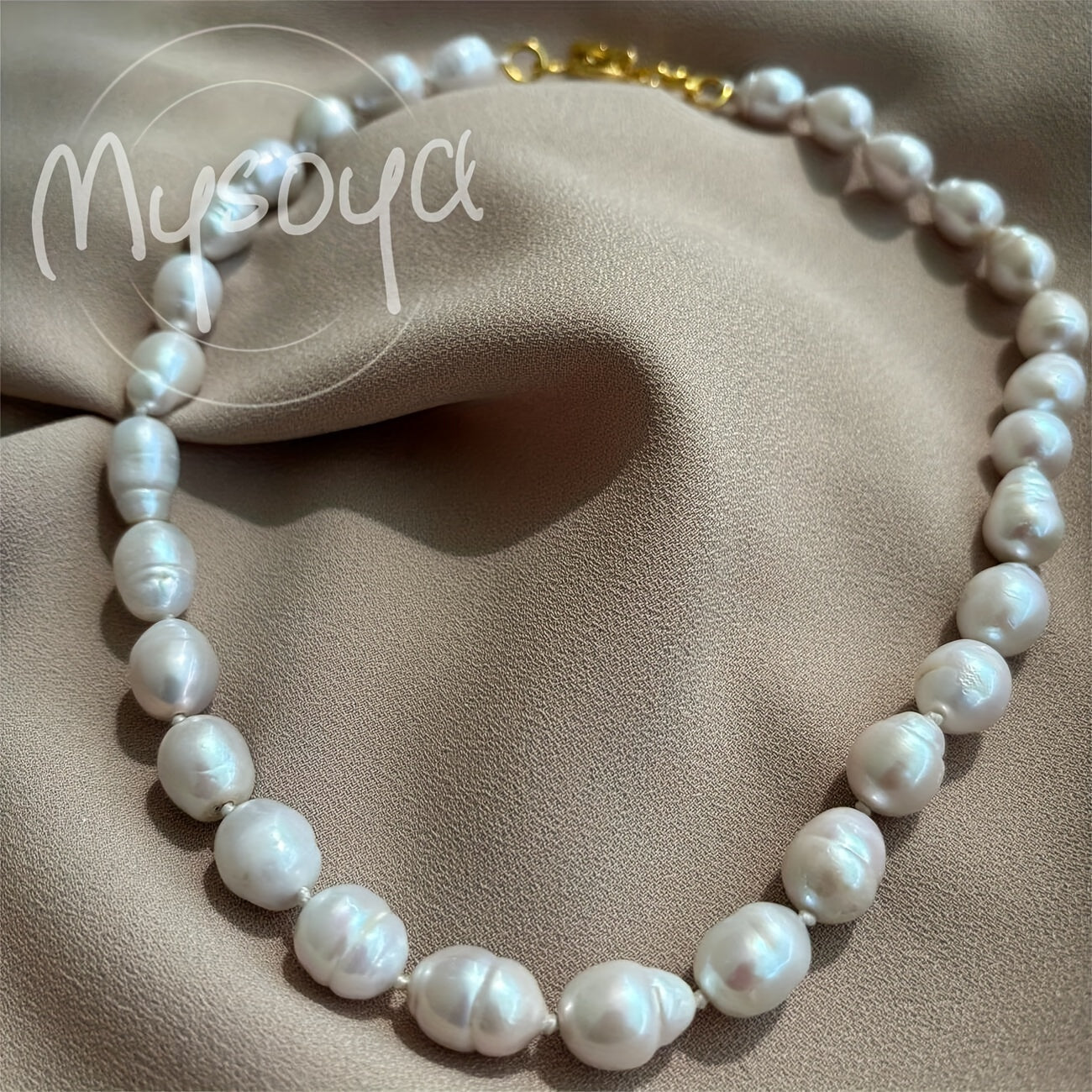 Exquisite handcrafted baroque pearl necklace featuring 10-12mm natural freshwater pearls. This stunning piece of jewelry comes beautifully packaged in a gift box, making it the perfect accessory for both daily wear and special occasions.