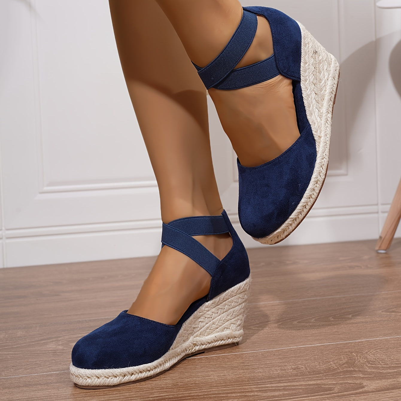 Women's slip-on wedge sandals with elastic cross straps, round toe, and non-slip sole.