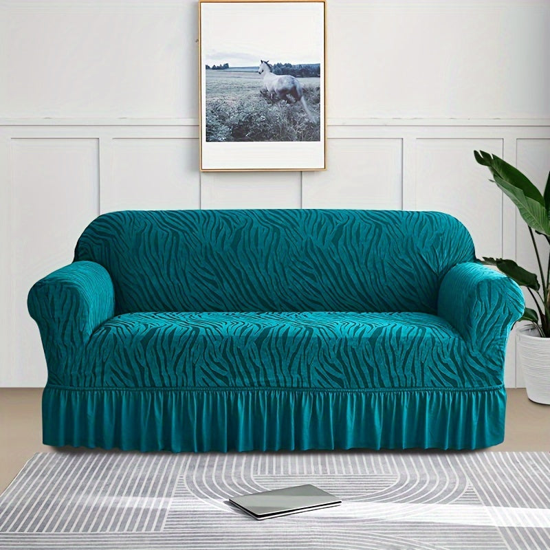 Wave pattern sofa slipcover with skirt, non-slip and dustproof. Protects furniture from cat scratches. Machine washable for easy cleaning. Suitable for bedroom, office, or living room décor.