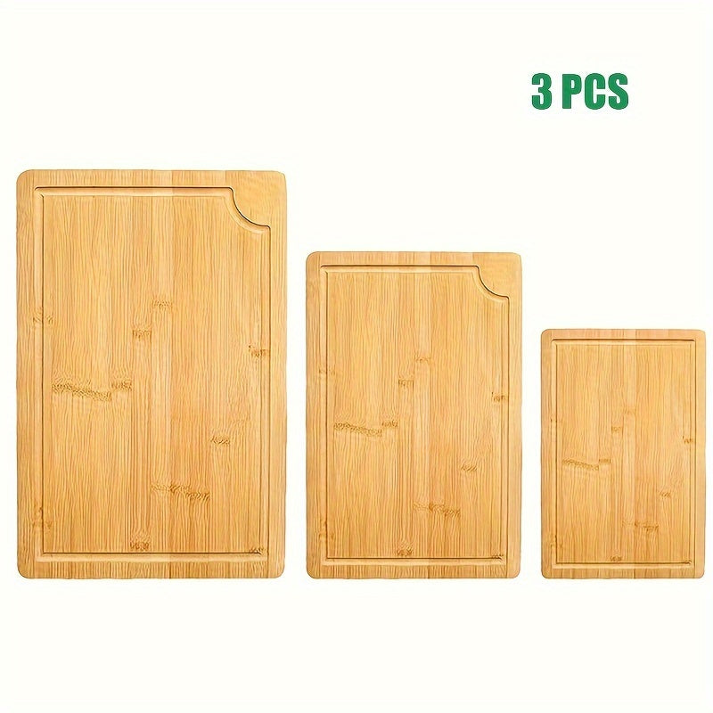 A collection of kitchen cutting boards made from high-quality wood, including bamboo. This set includes three cutting boards with juice grooves, perfect for preparing meats, fruits, and vegetables. Also included are serving boards with easy-to-grip