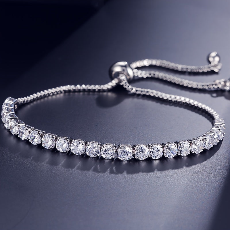 Stylish vintage-inspired cubic zirconia tennis bracelet with adjustable copper chain and sparkling rhinestones, ideal for parties or casual wear, great Valentine's Day gift.