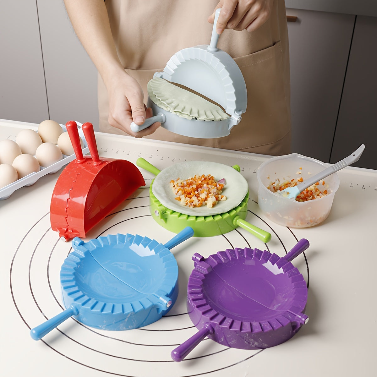 One piece of a plastic dumpling maker, also known as a dumpling mold or manual dumpling wrapper. This versatile kitchen gadget can also be used as an empanada maker and comes with kitchen accessories.