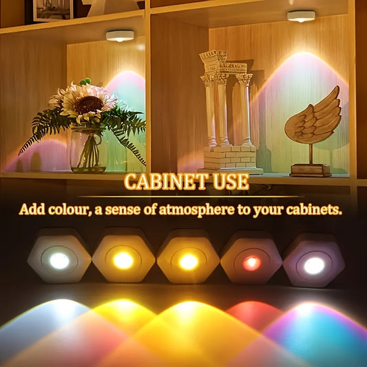 Creative white hexagonal cat eye sunset red projection sunset lamp with touch dimmable LED technology, battery powered for cabinet and wall lighting.