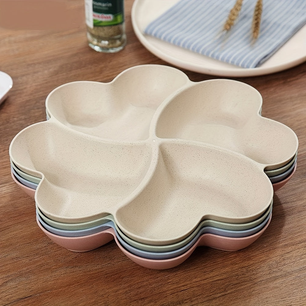 4 durable heart-shaped party snack serving trays in blue, green, beige, and pink. Perfect for organizing snacks at parties and gatherings. Made of lightweight plastic.