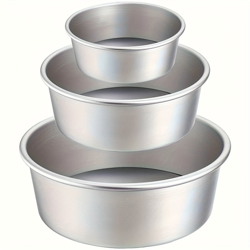 Cake Pan Set includes three pieces in sizes of 10.16cm, 15.24cm, and 20.32cm. These round aluminium cake molds have removable bottoms, making them convenient for baking cakes. Perfect addition to your kitchen tools collection.